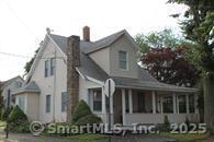 19 Rhea Street New Haven, CT 06512 - Photo 11 of 23 a view of a white house next to a yard