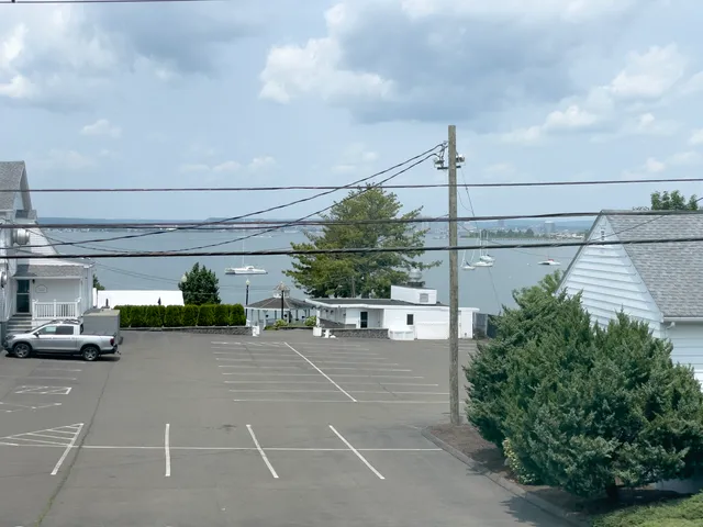 a view of a street with cars