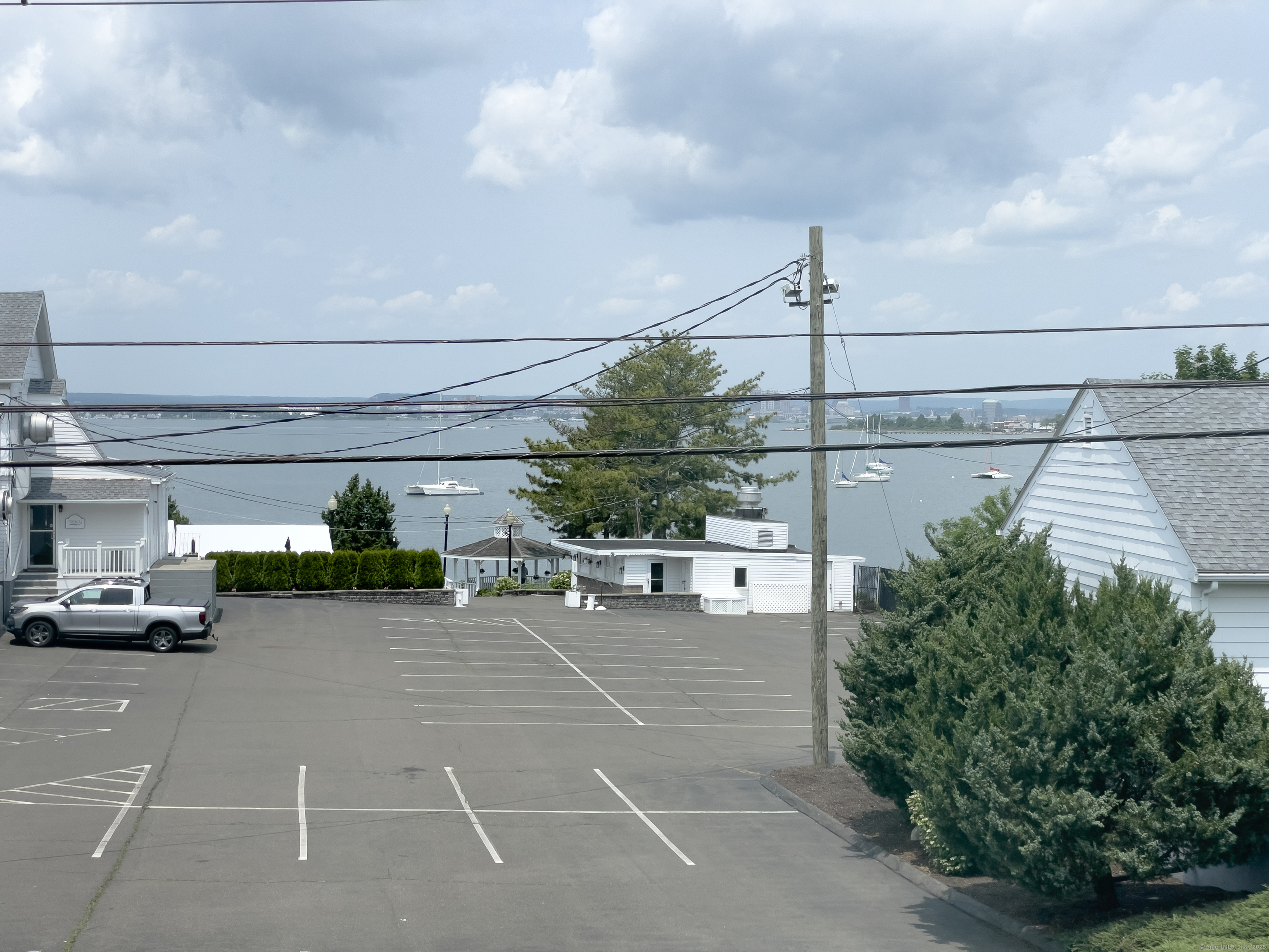 19 Rhea Street New Haven, CT 06512 - Photo 13 of 23 a view of a street with cars