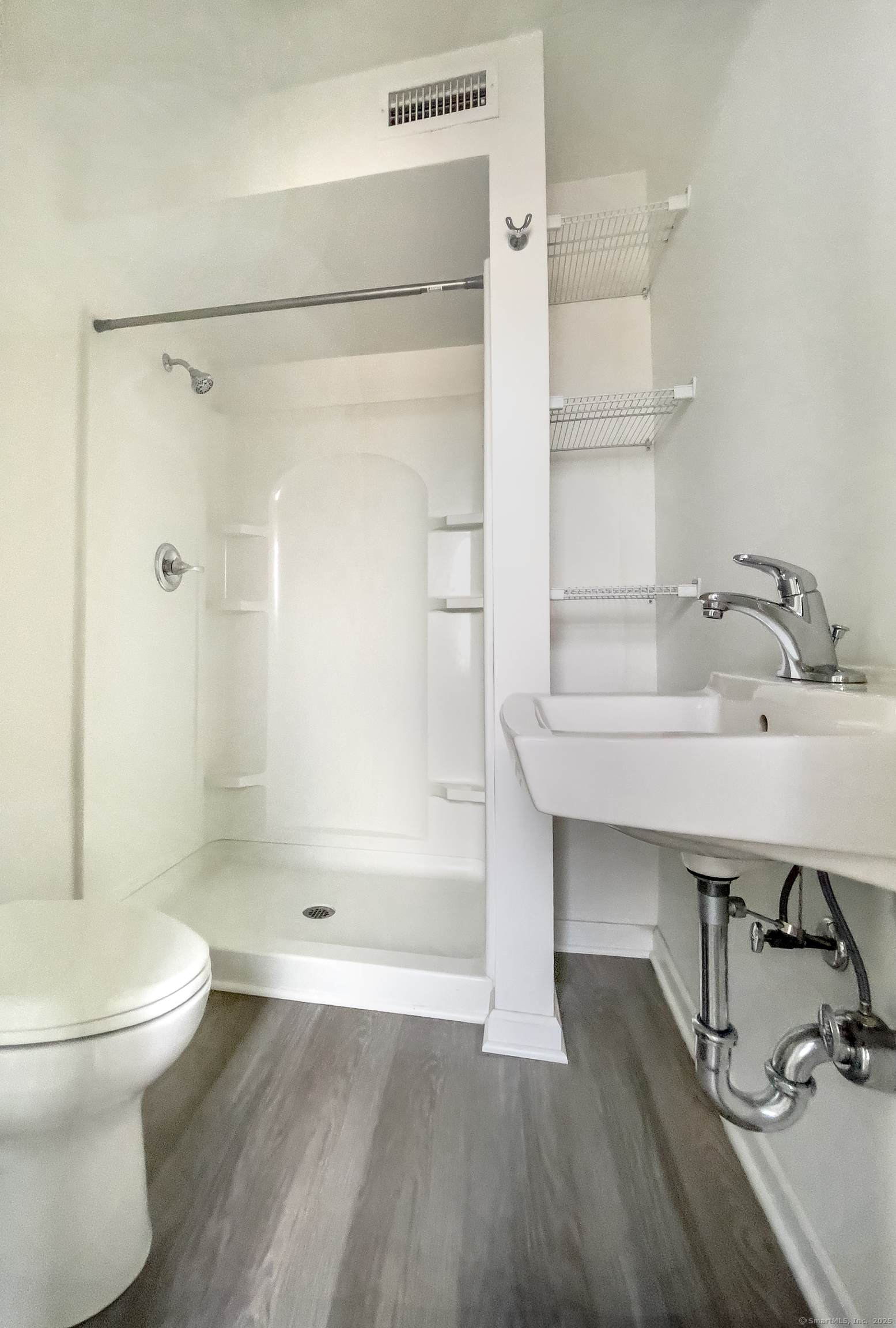 19 Rhea Street New Haven, CT 06512 - Photo 14 of 23 a bathroom with a sink toilet and shower