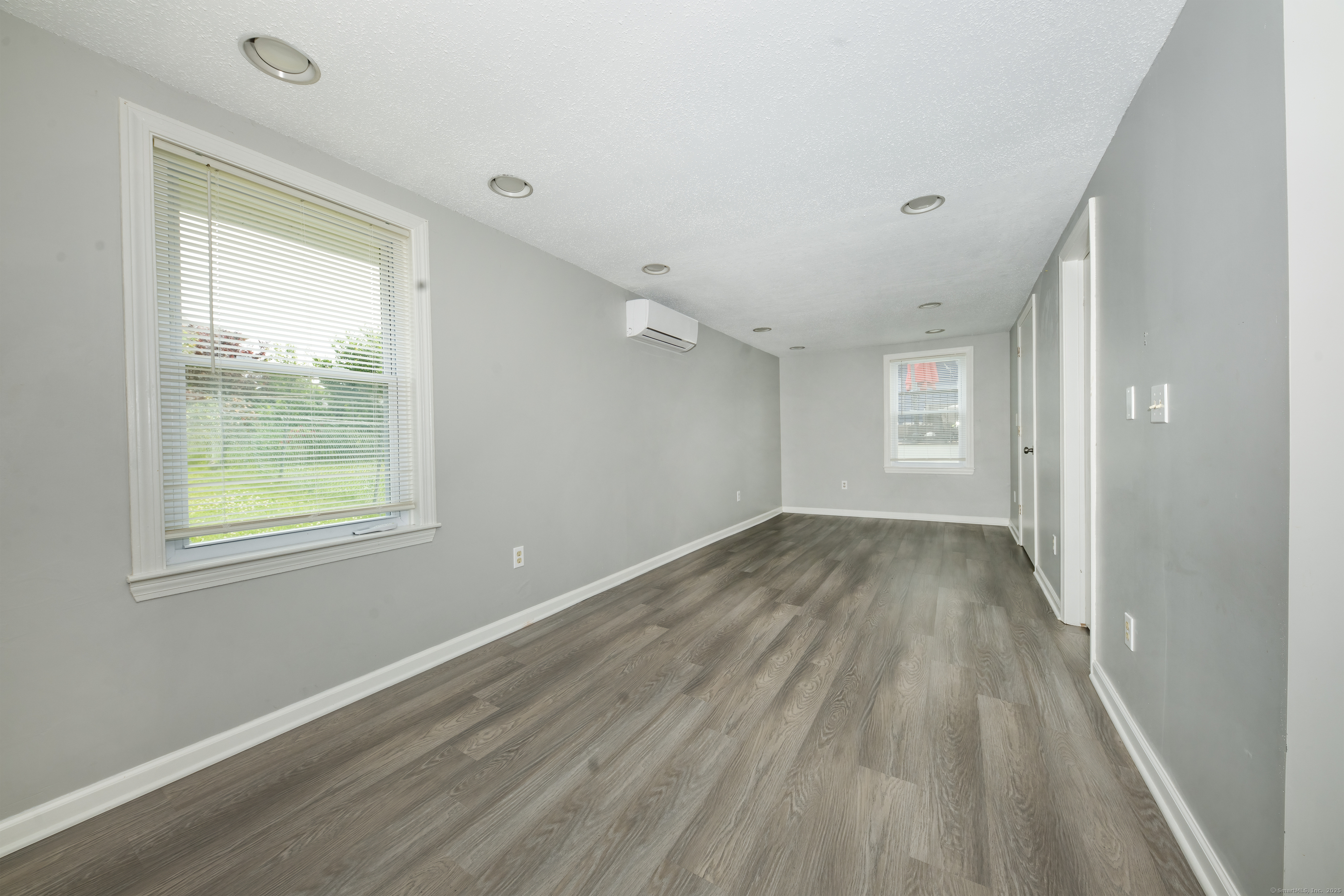 19 Rhea Street New Haven, CT 06512 - Photo 22 of 23 a view of a room with wooden floor and windows