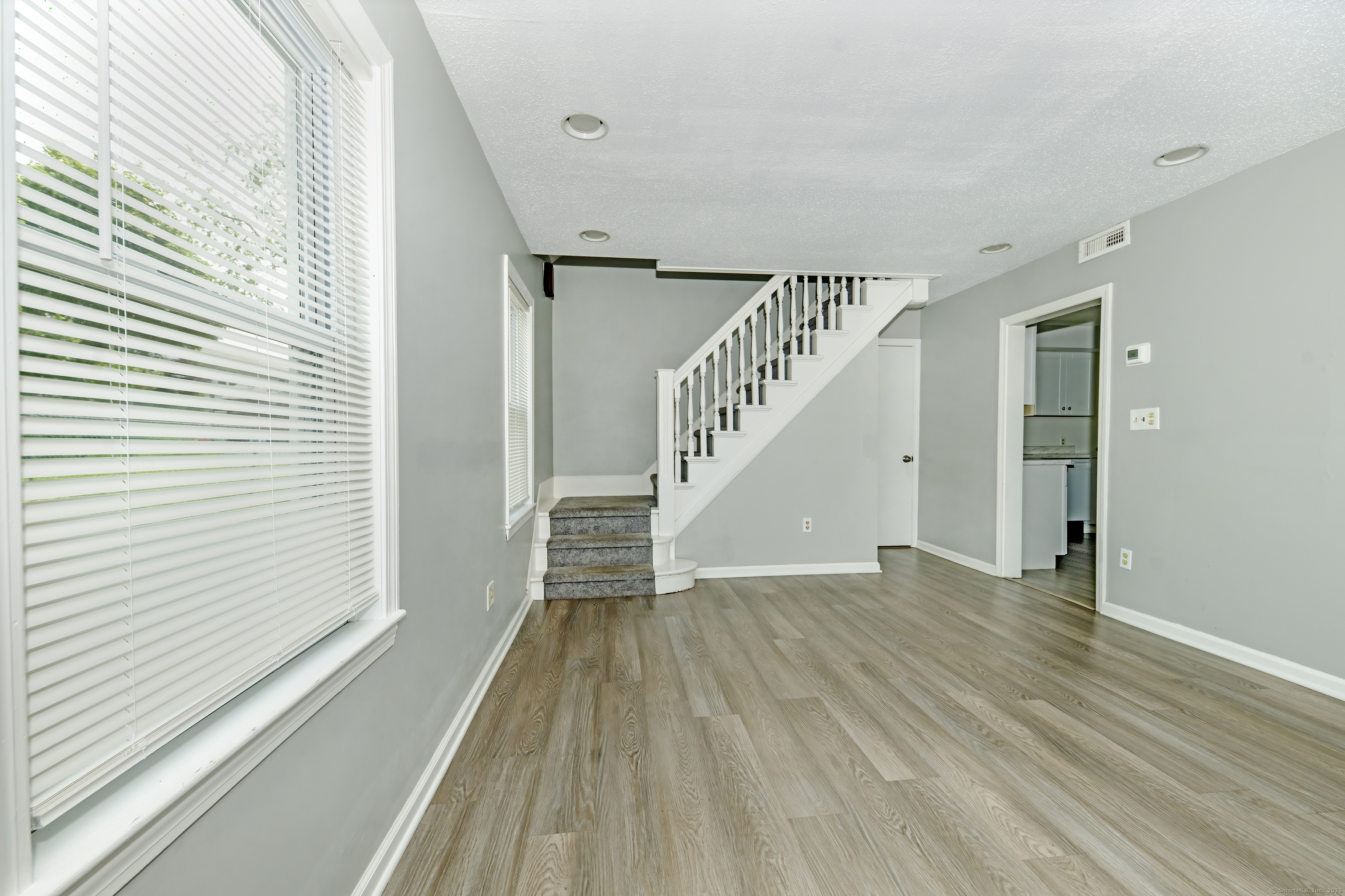19 Rhea Street New Haven, CT 06512 - Photo 5 of 23 a view of entryway with wooden floor