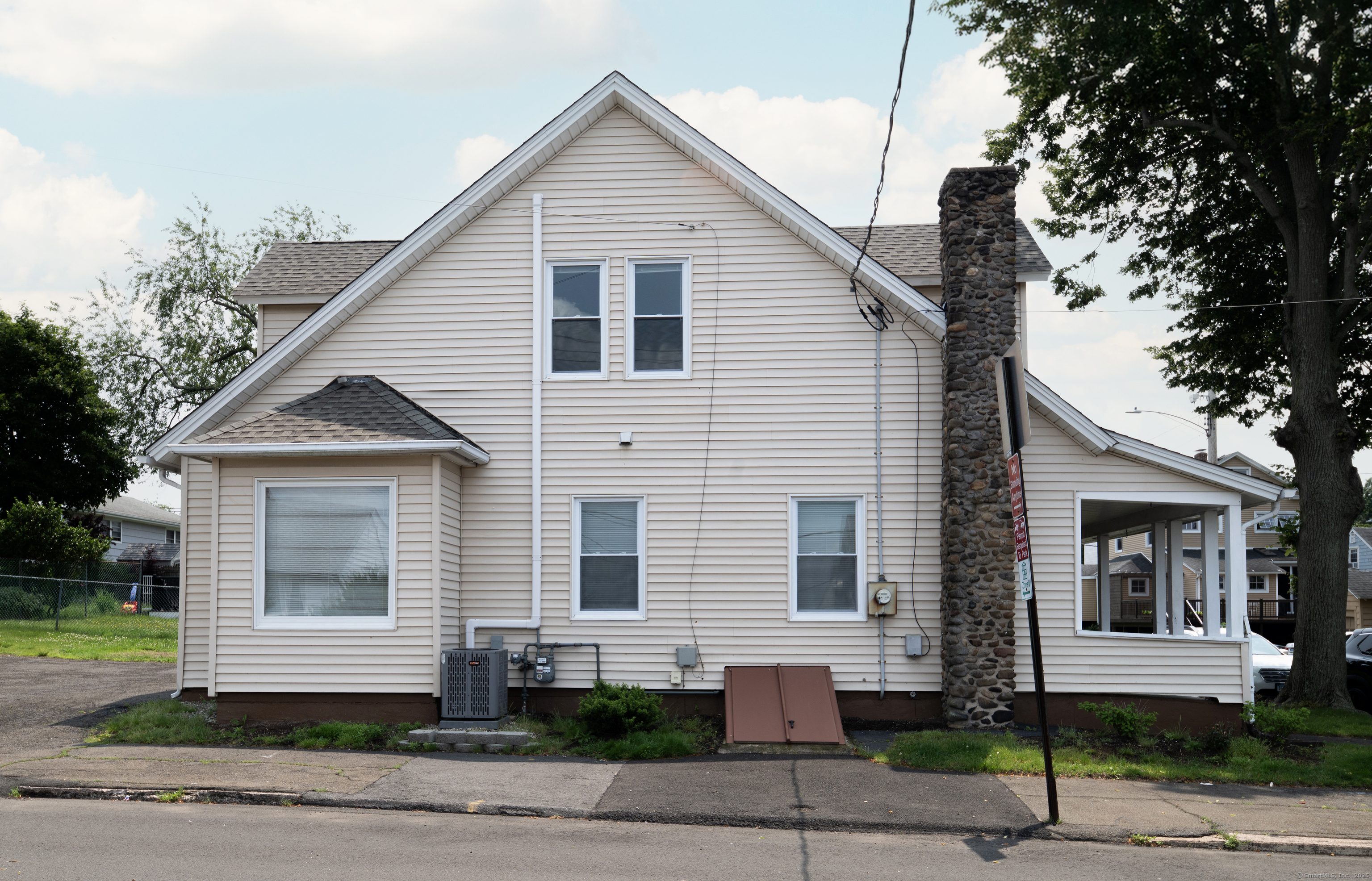 19 Rhea Street New Haven, CT 06512 - Photo 10 of 23 a front view of a house with a yard