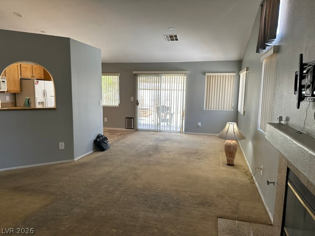 686 Skyline Road Henderson, NV 89002 - Photo 13 of 13 An open floor plan connects the carpeted living space directly to the kitchen.