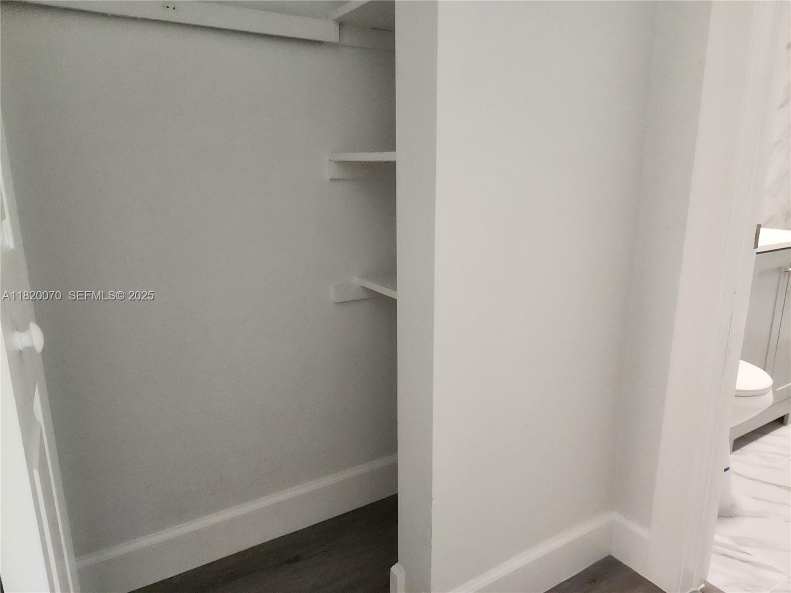 1239 Marseille Drive, Unit 4 Miami Beach, FL 33141 - Photo 9 of 15 a small space with a window