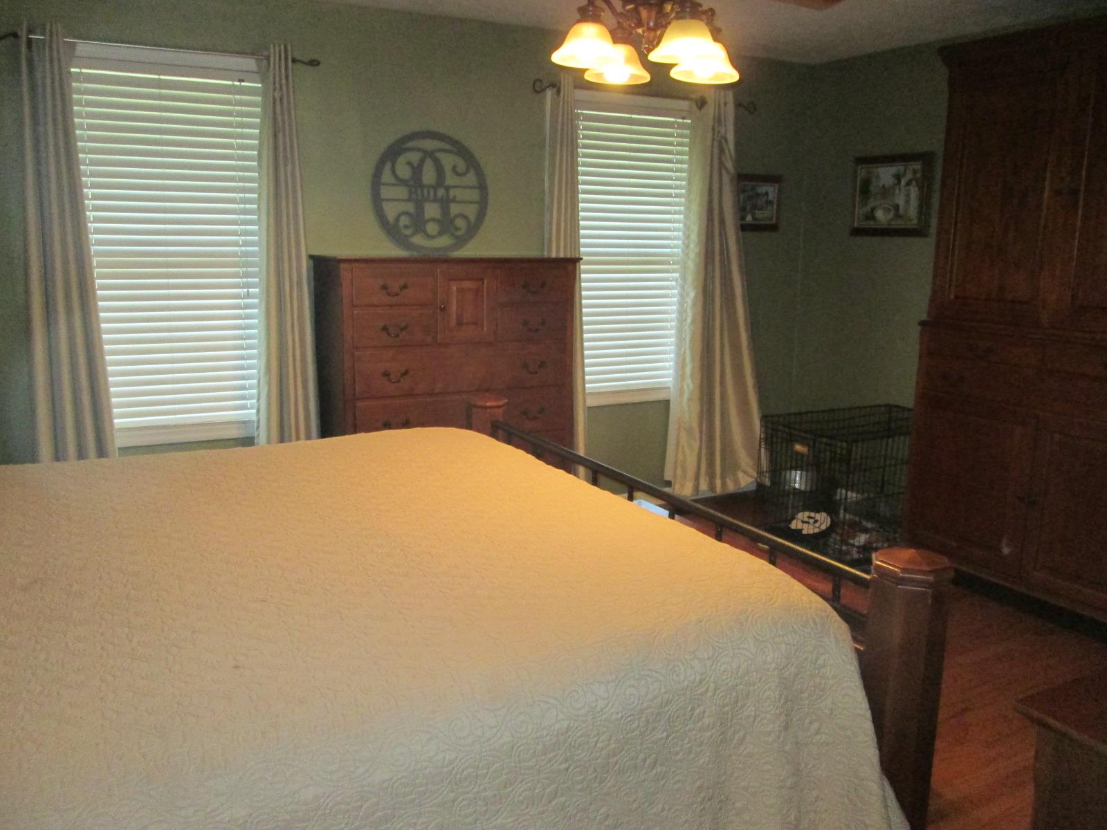 708 3rd Avenue West Springfield, TN 37172 - Photo 12 of 30 a bedroom with a bed and a window