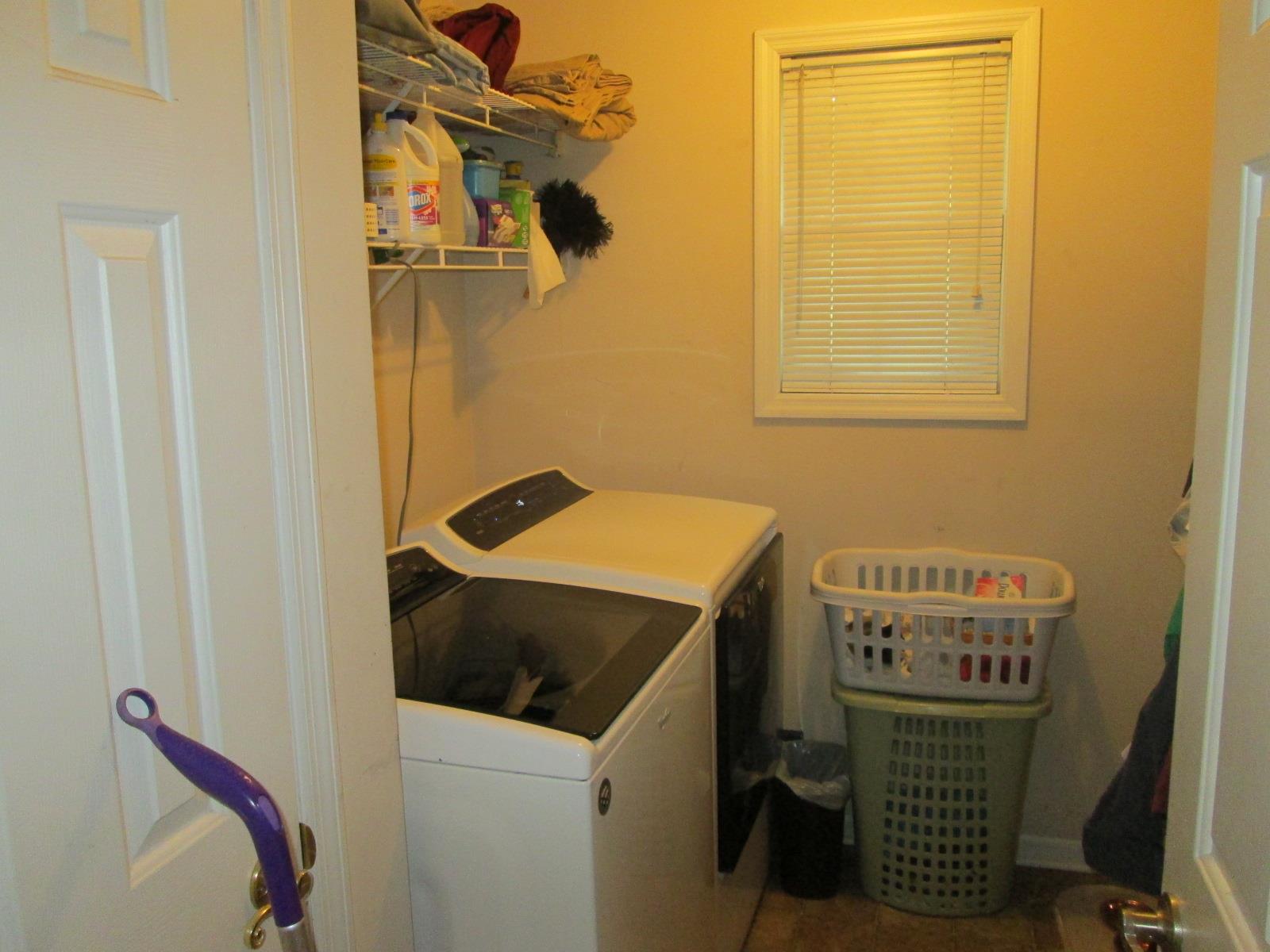 708 3rd Avenue West Springfield, TN 37172 - Photo 15 of 30 a utility room with dryer and washer