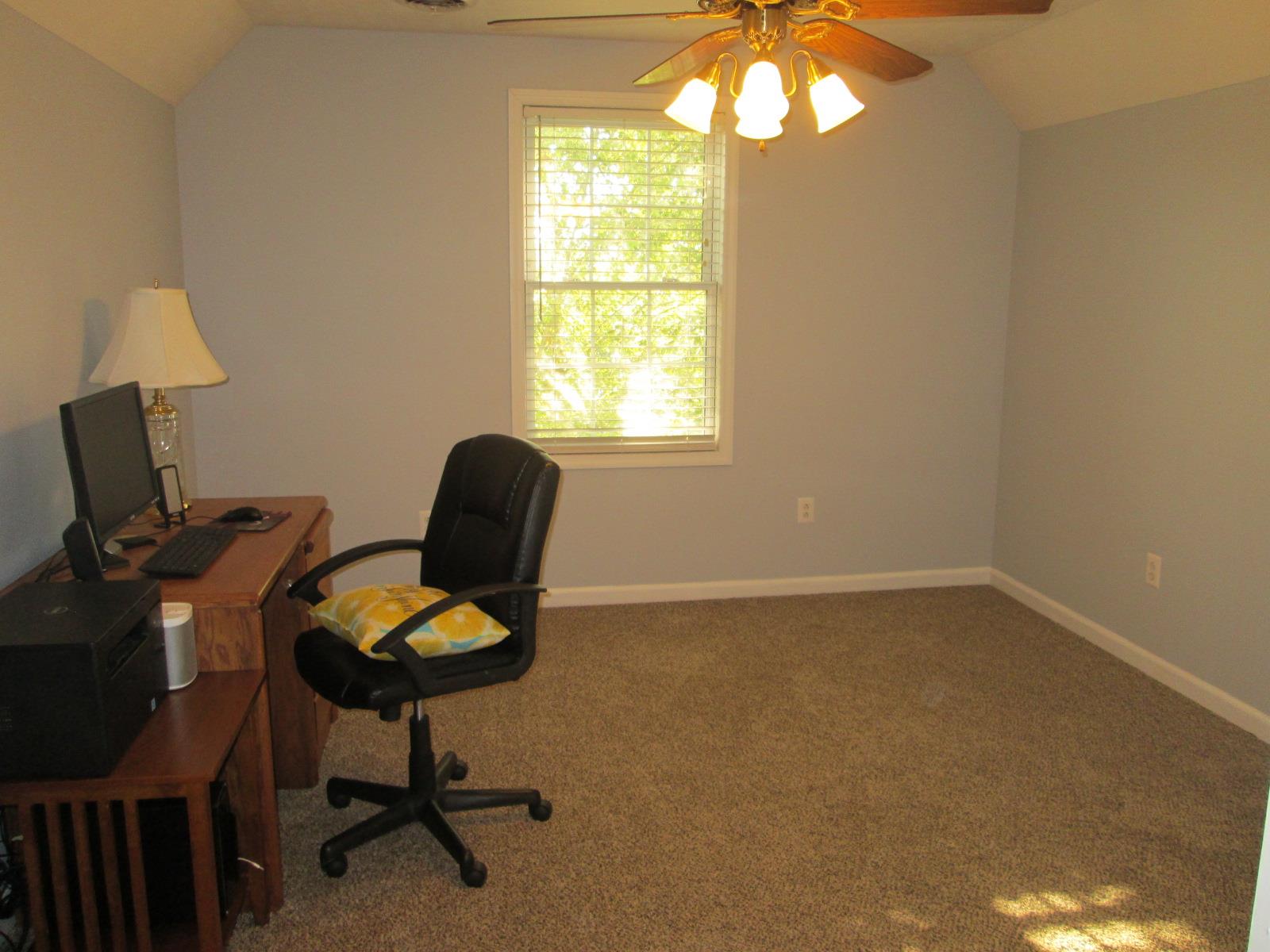 708 3rd Avenue West Springfield, TN 37172 - Photo 21 of 30 a room with furniture and a window