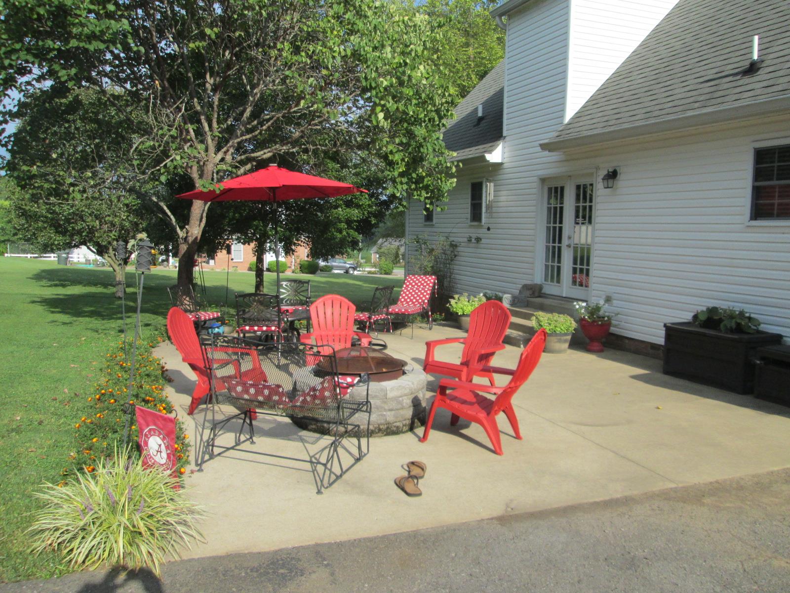 708 3rd Avenue West Springfield, TN 37172 - Photo 23 of 30 an outdoor space with furniture and umbrella