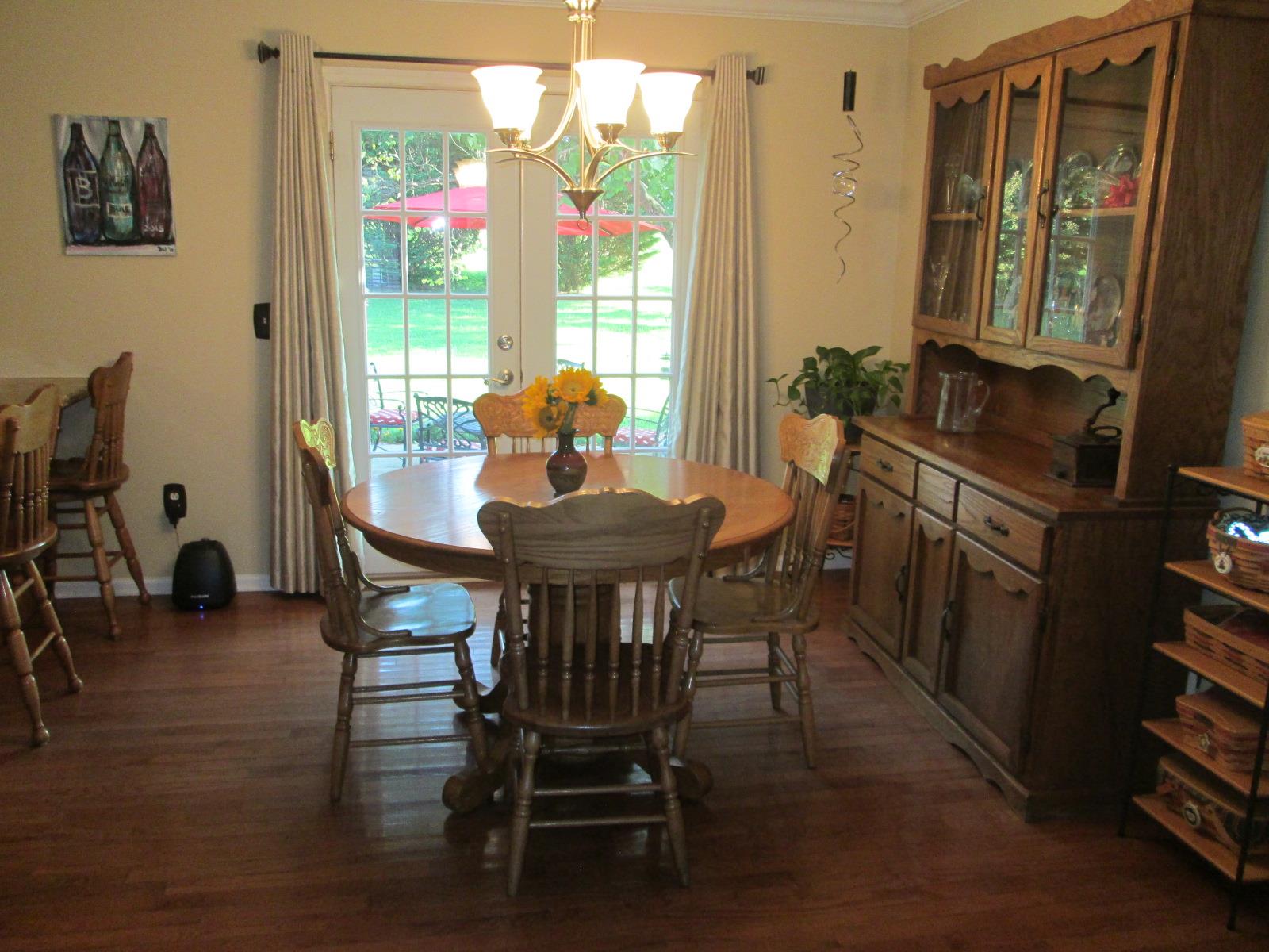 708 3rd Avenue West Springfield, TN 37172 - Photo 10 of 30 a view of a dining room with furniture and a window