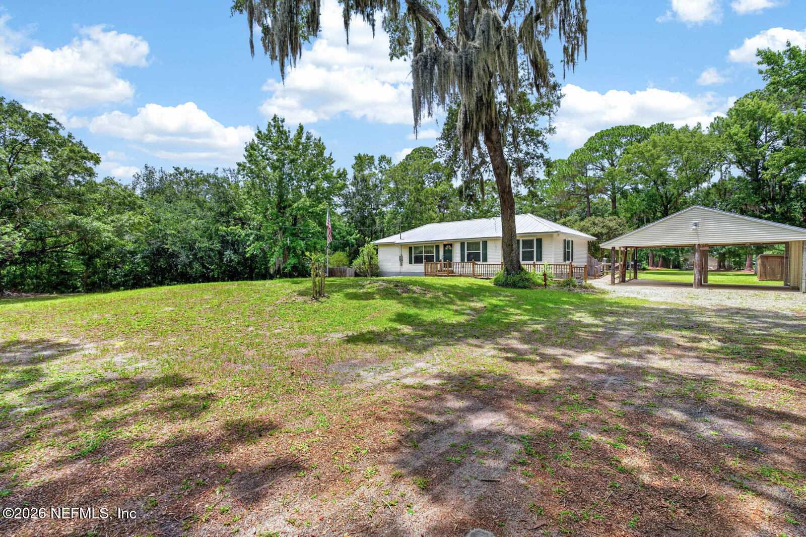 1950 Lightsey Road St. Augustine, FL 32084 - Photo 3 of 57 a house with swimming pool in front of it