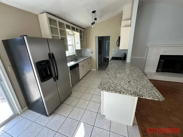 a view of empty room with front door