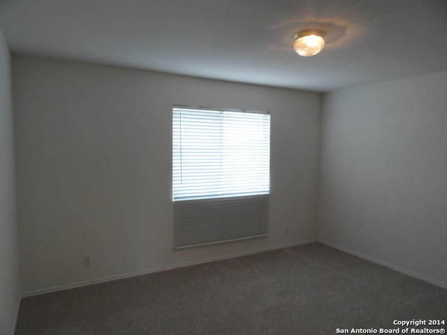 8026 Rio NIEBLA San Antonio, TX 78249 - Photo 13 of 15 an empty room with a window
