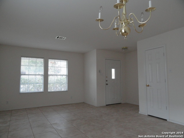 8026 Rio NIEBLA San Antonio, TX 78249 - Photo 2 of 15 a view of a livingroom with a window