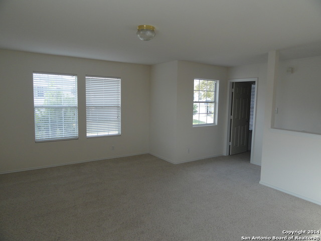8026 Rio NIEBLA San Antonio, TX 78249 - Photo 7 of 15 an empty room with windows