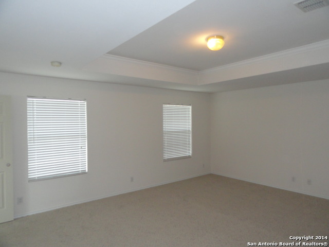 8026 Rio NIEBLA San Antonio, TX 78249 - Photo 10 of 15 an empty room with a window and mirror fan