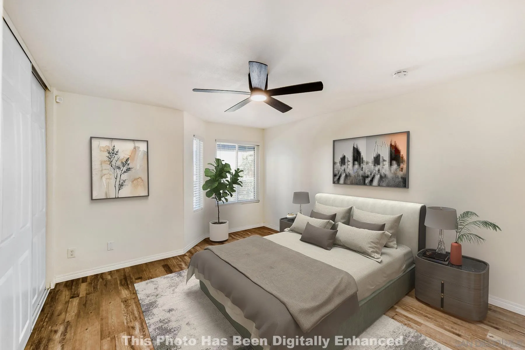 8308 Regents Road, Unit 1H San Diego, CA 92122 - Photo 4 of 23 a bedroom with a bed and a chandelier