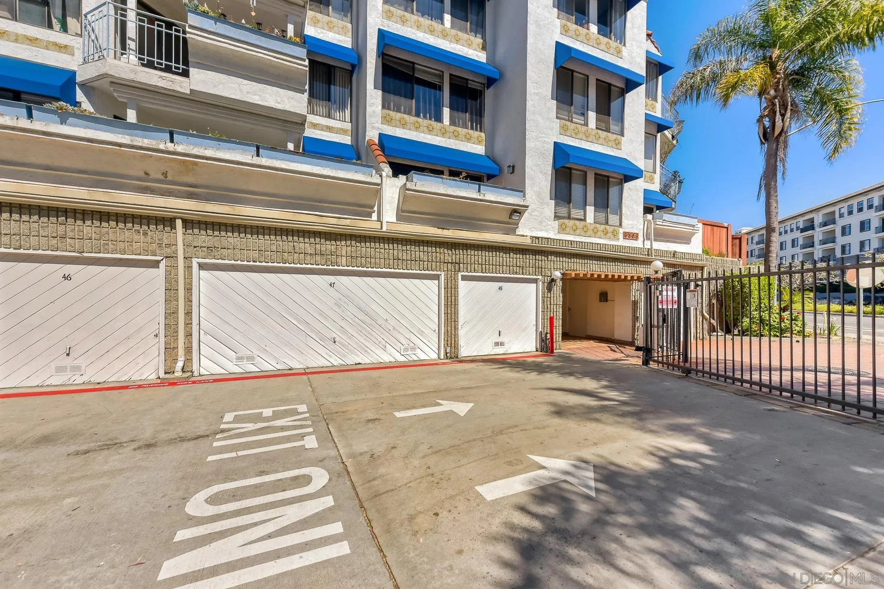 8308 Regents Road, Unit 1H San Diego, CA 92122 - Photo 6 of 23 a view of a building with a outdoor space
