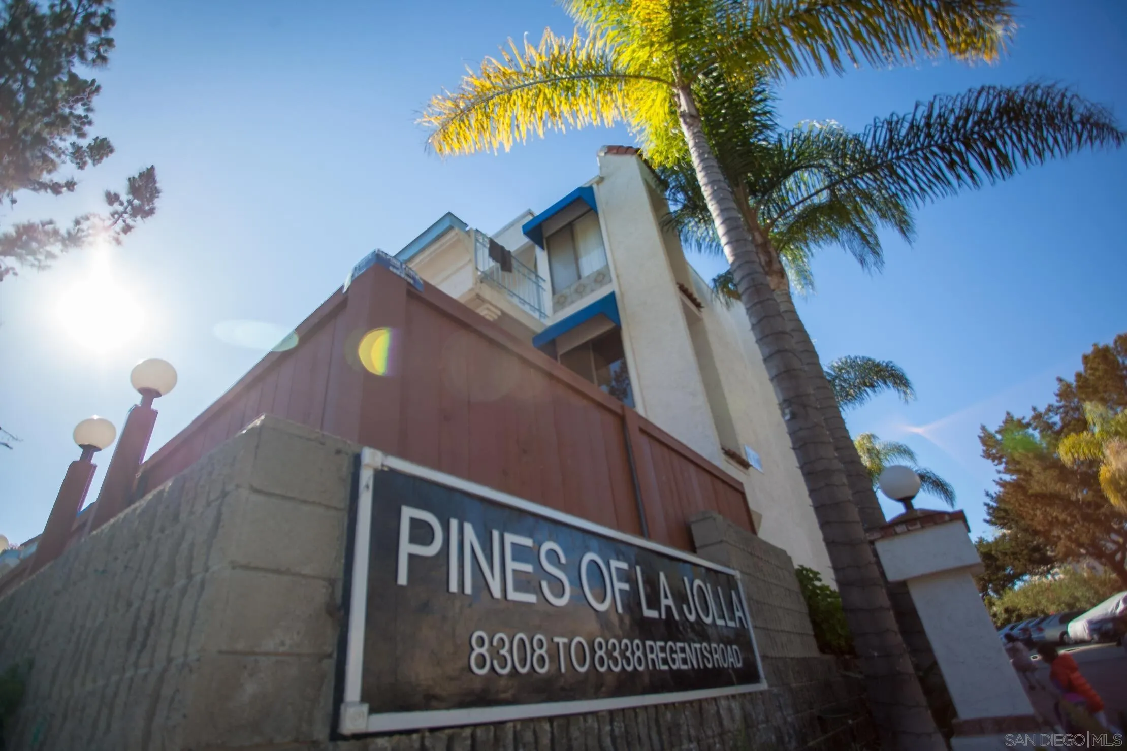 8308 Regents Road, Unit 1H San Diego, CA 92122 - Photo 10 of 23 a street sign that is on a wall