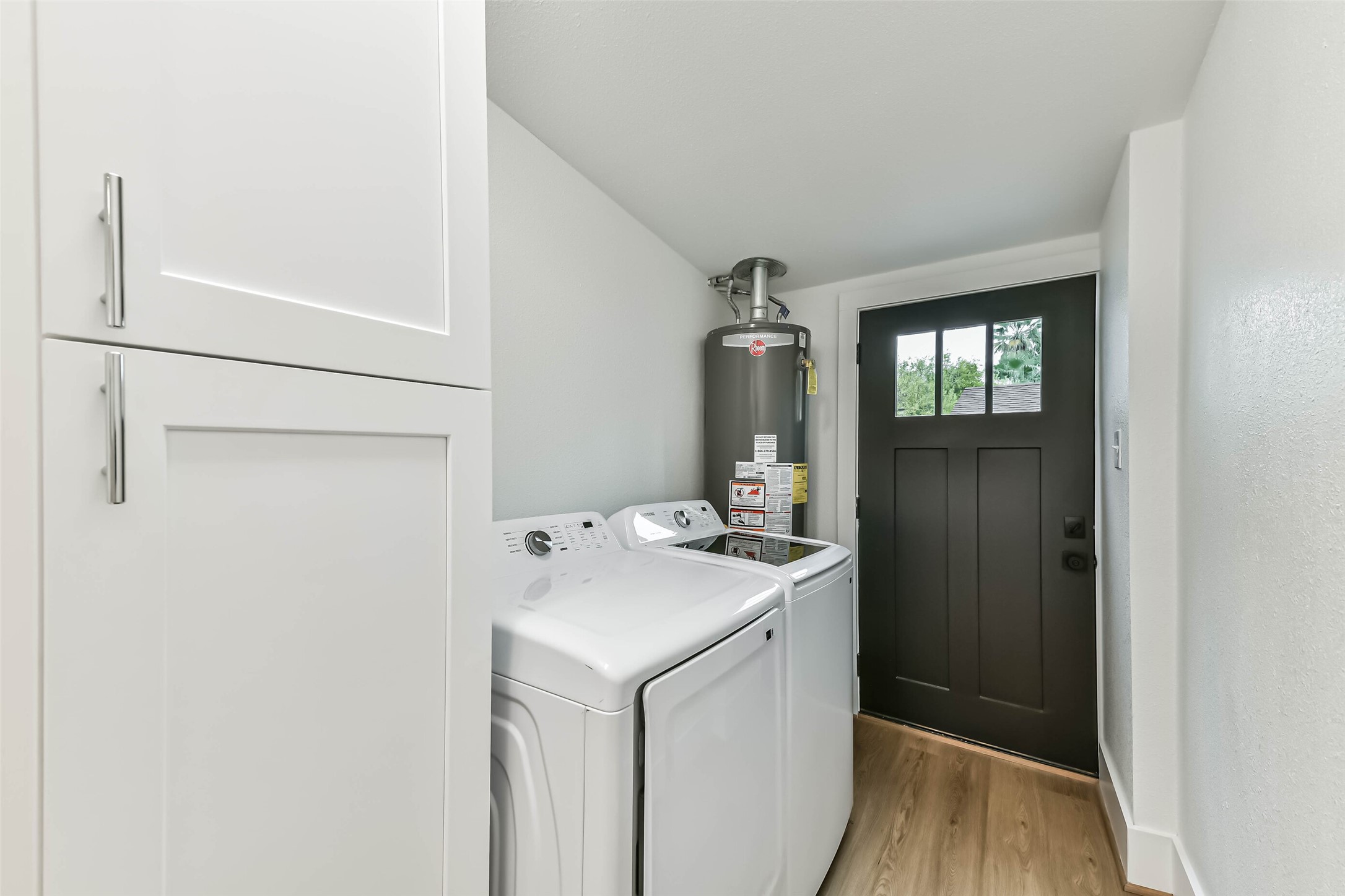 1616 38th Street Galveston, TX 77550 - Photo 16 of 26 a utility room with dryer and washer