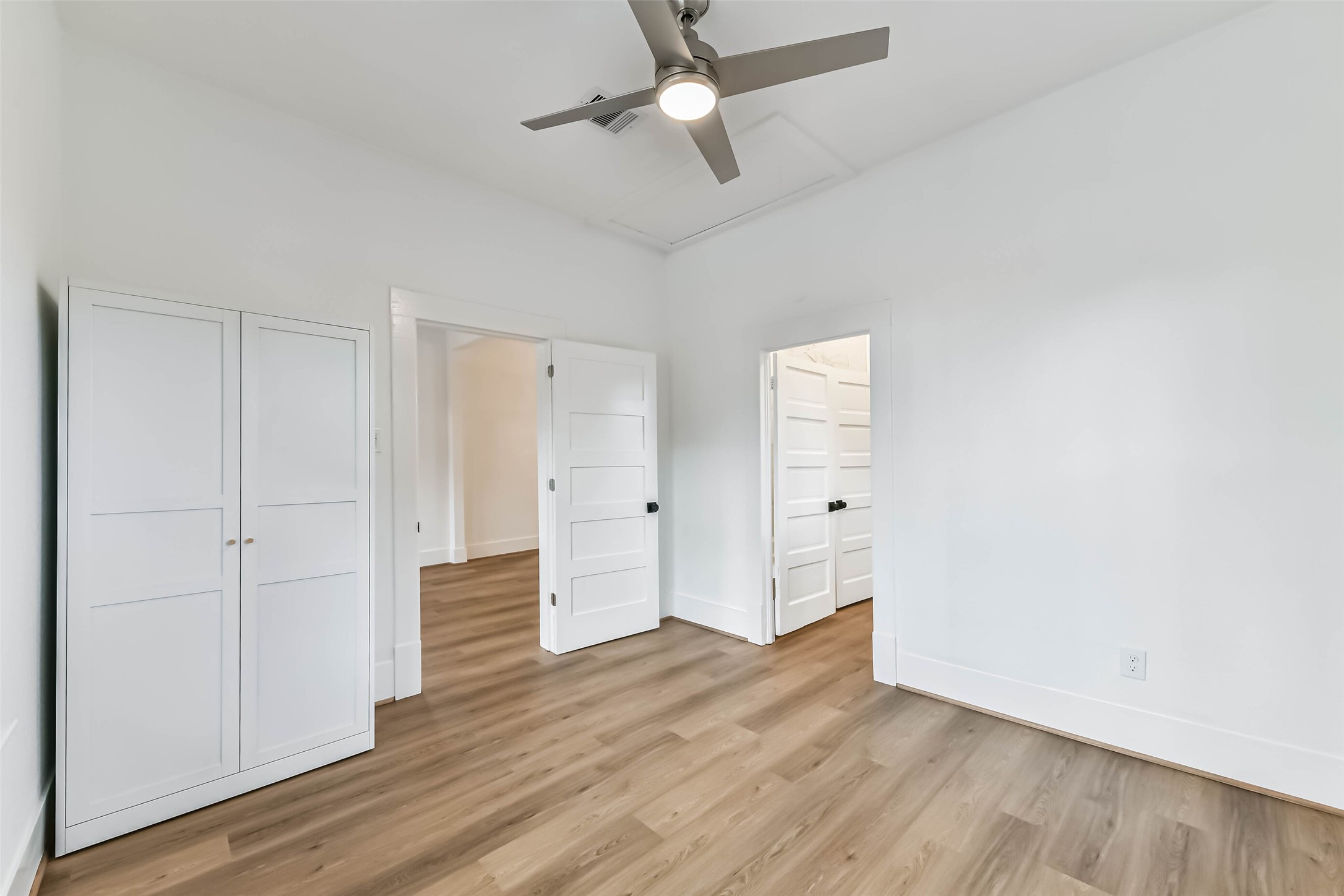 1616 38th Street Galveston, TX 77550 - Photo 19 of 26 a view of empty room with wooden floor