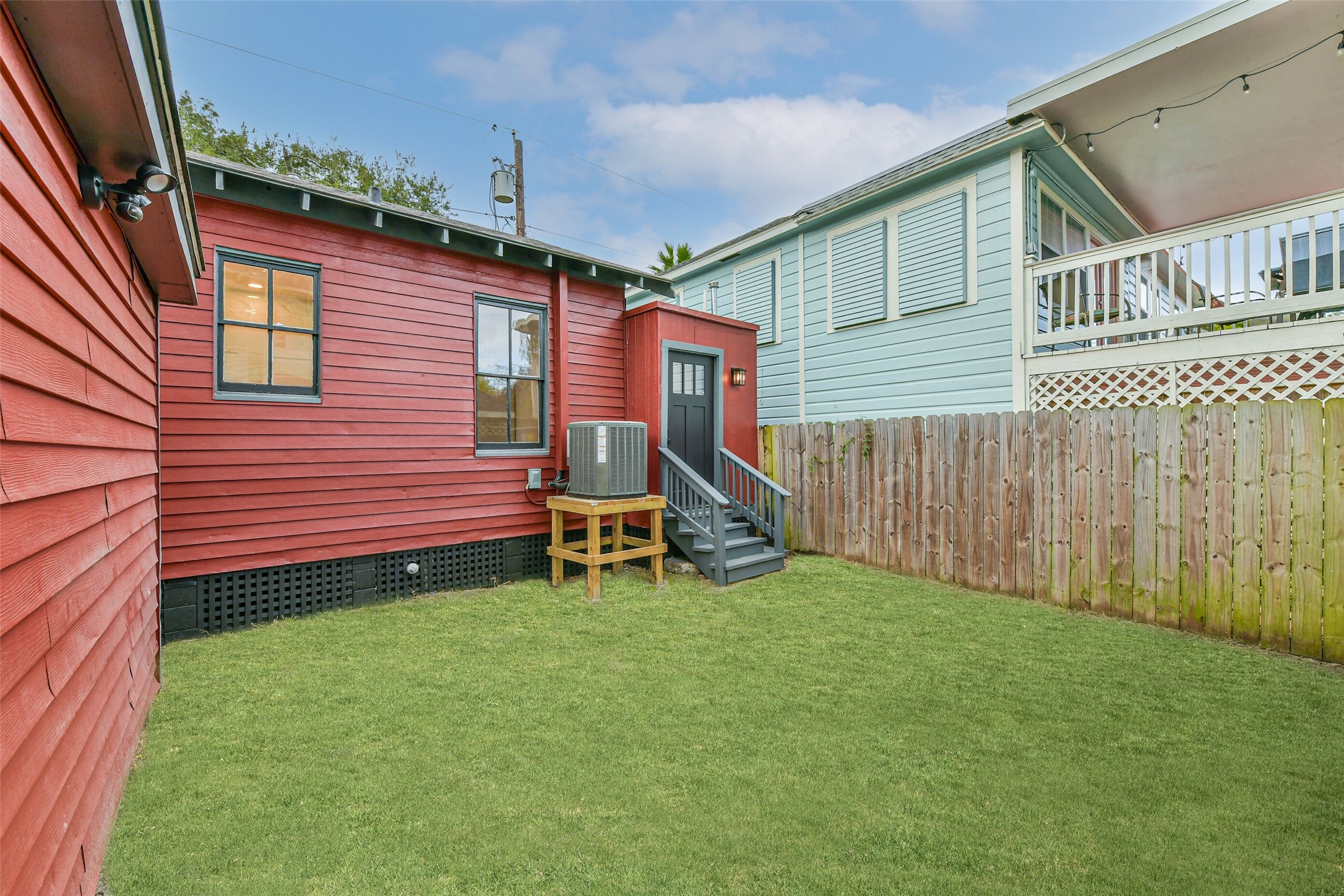 1616 38th Street Galveston, TX 77550 - Photo 24 of 26 a view of a house with a yard and sitting area