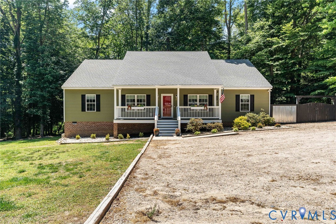 1755 Dispatch Road Quinton, VA 23141 - Photo 75 of 86 a front view of a house with yard patio and green space