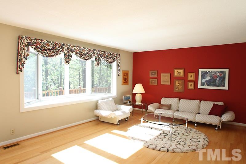 3208 Caldwell Drive Raleigh, NC 27607 - Photo 4 of 22 a living room with furniture and a large window