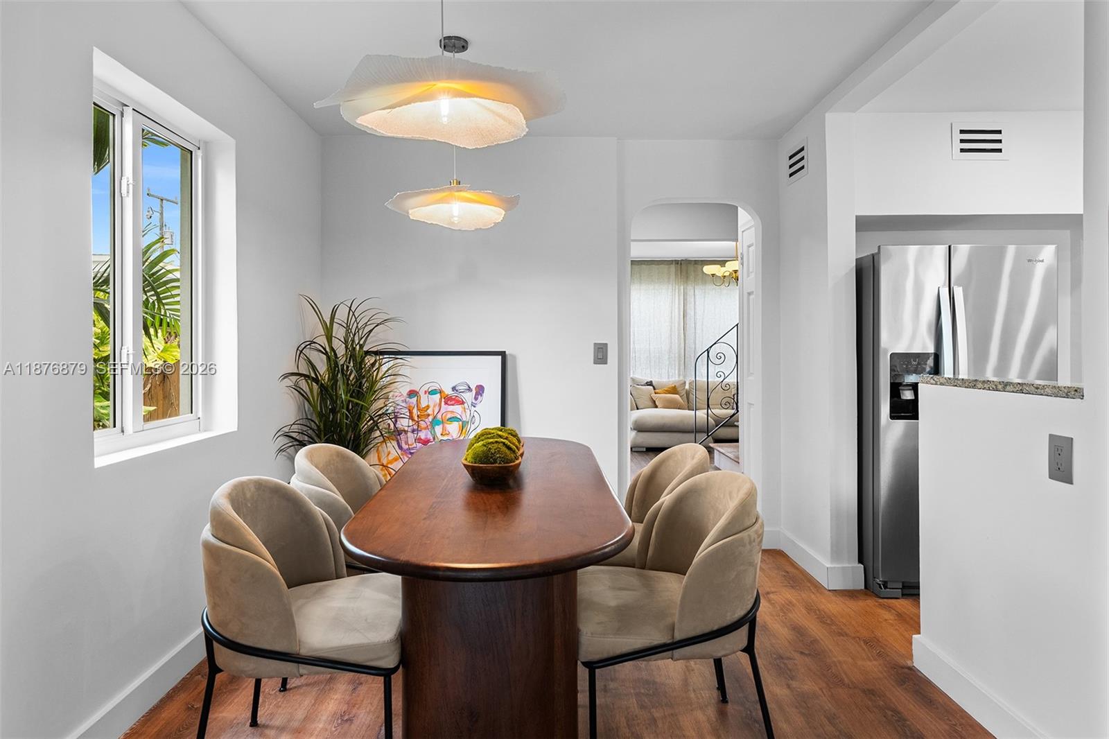 642 86th Street Miami Beach, FL 33141 - Photo 25 of 48 a view of a dining room with furniture and window