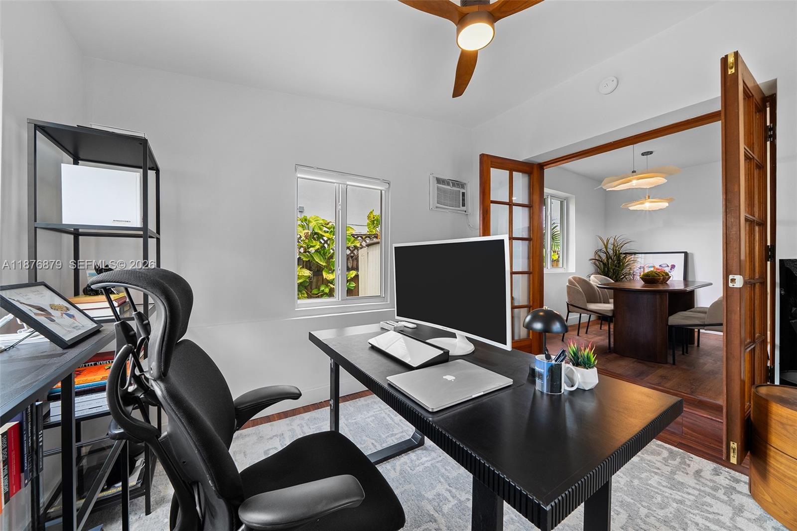 642 86th Street Miami Beach, FL 33141 - Photo 26 of 48 a view of a workspace with furniture