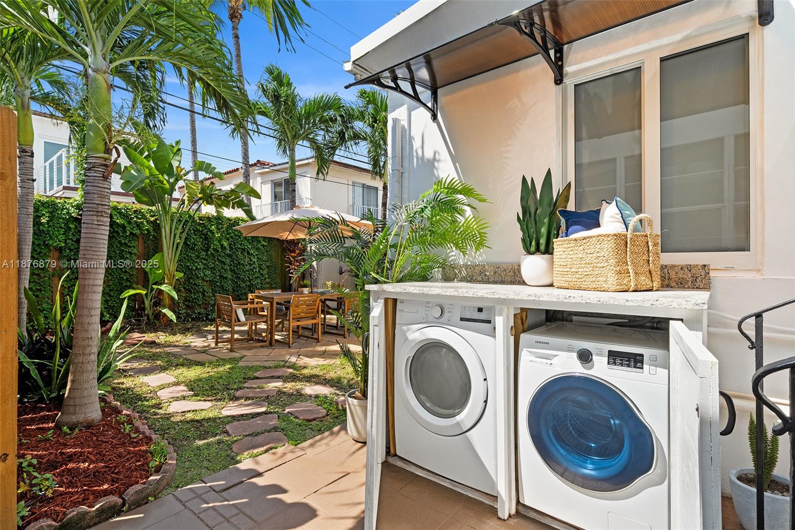 642 86th Street Miami Beach, FL 33141 - Photo 35 of 48 a view of a house with a patio