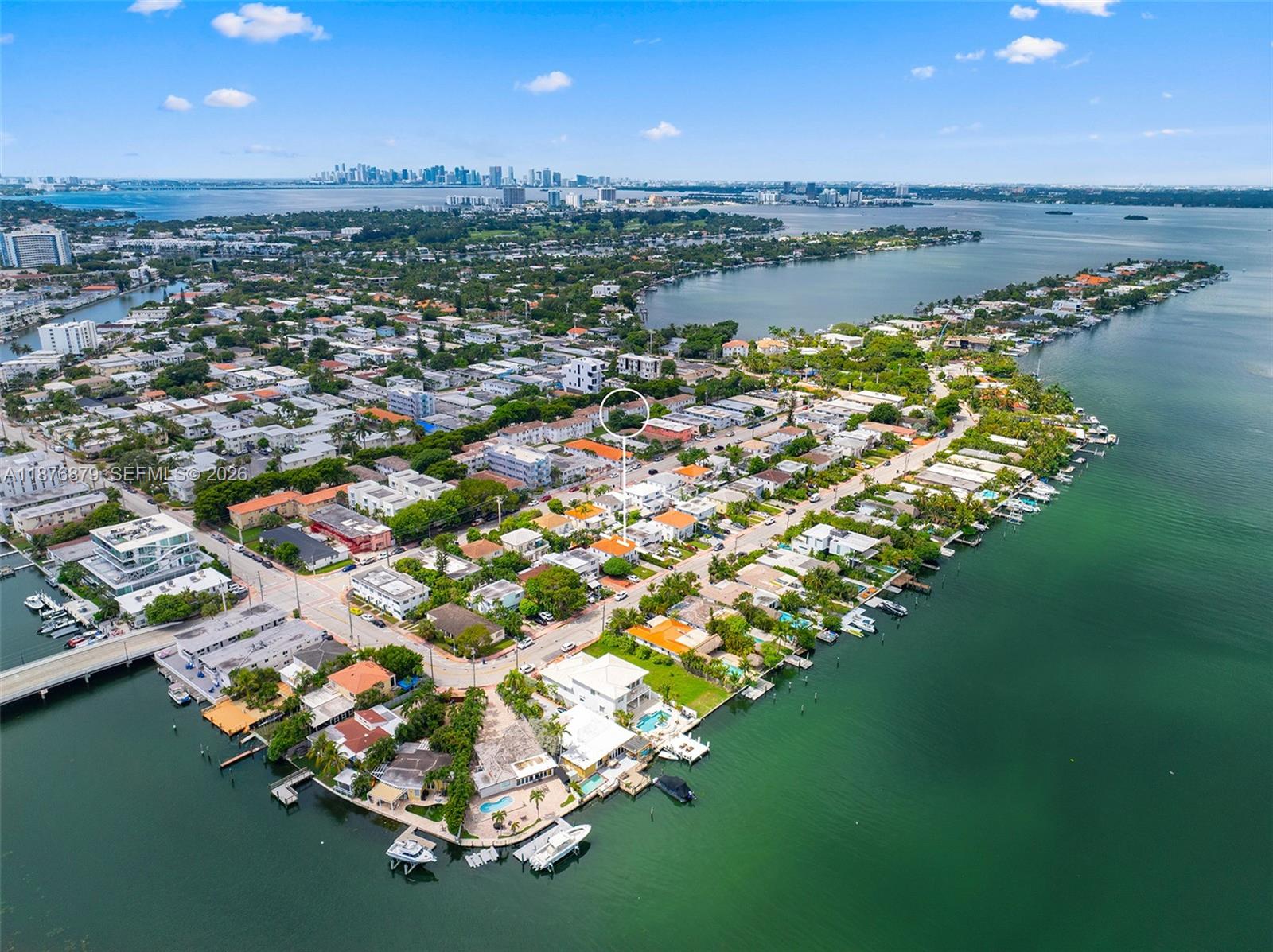 642 86th Street Miami Beach, FL 33141 - Photo 43 of 48 an aerial view of a houses with a lake view