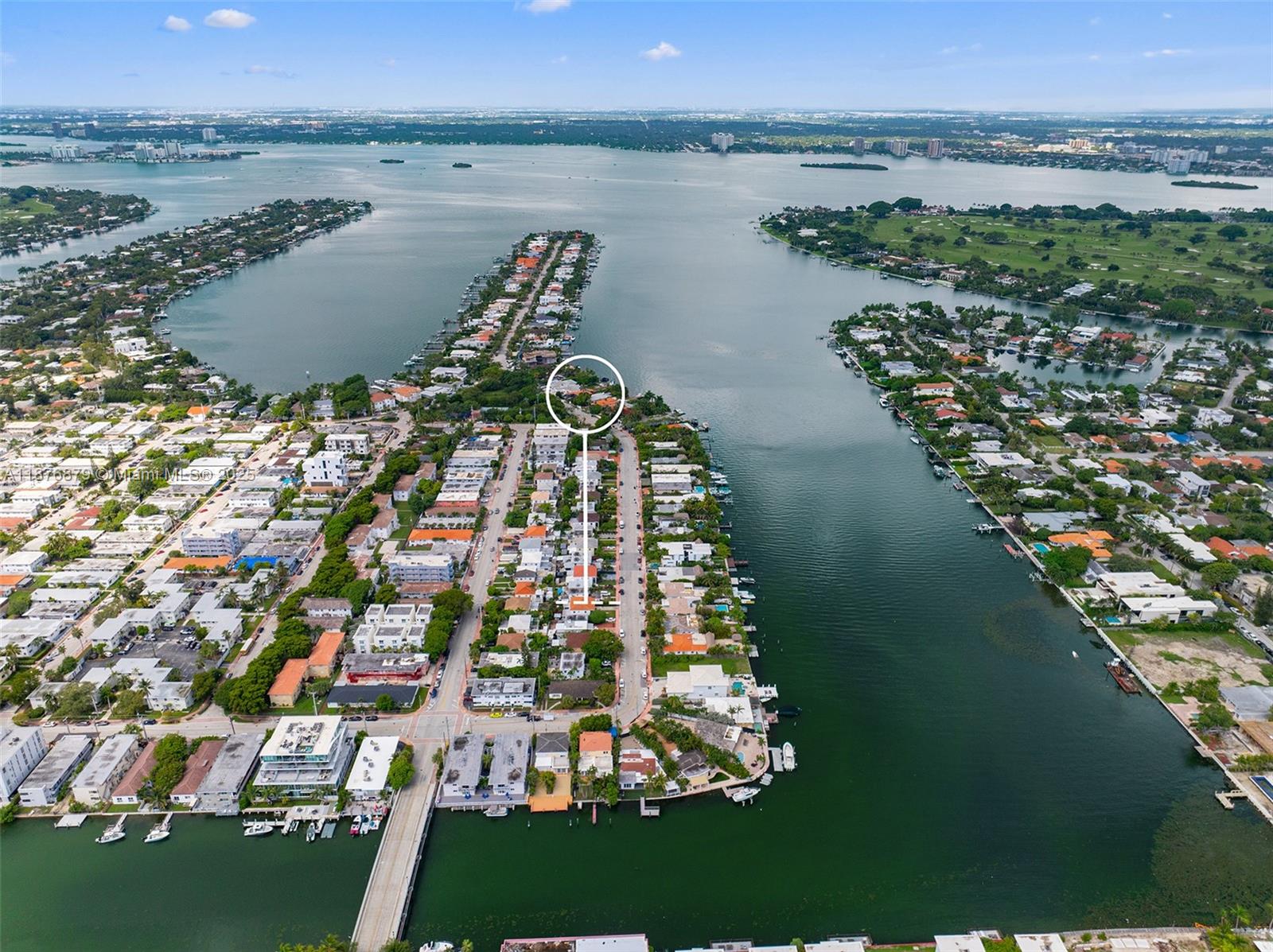 642 86th Street Miami Beach, FL 33141 - Photo 46 of 48 a view of a lake with a city
