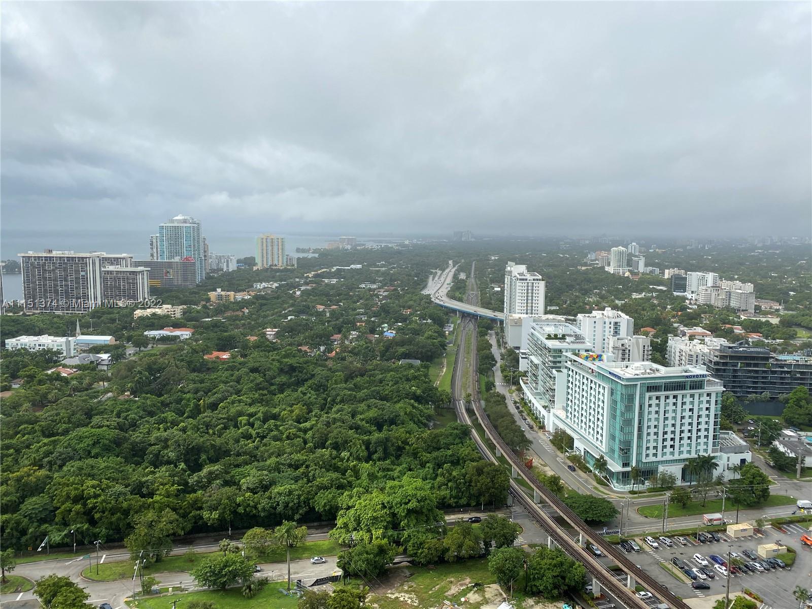 60 Southwest 13th Street, Unit 3003 Miami, FL 33130 - Photo 9 of 22 a view of a city with tall buildings