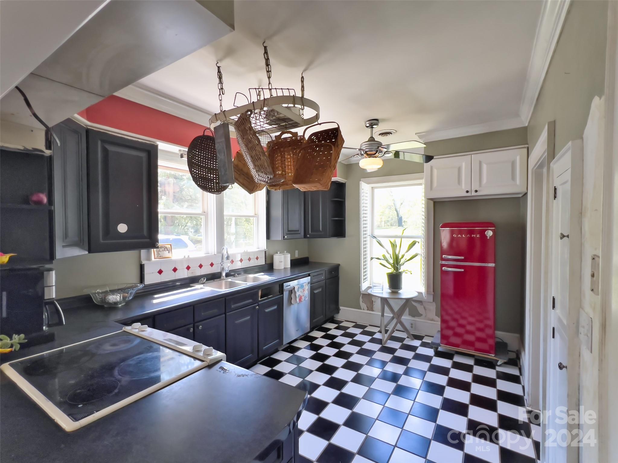 496 Chimney Rock Road Rutherfordton, NC 28139 - Photo 11 of 37 a kitchen with stainless steel appliances granite countertop a stove a sink and a microwave