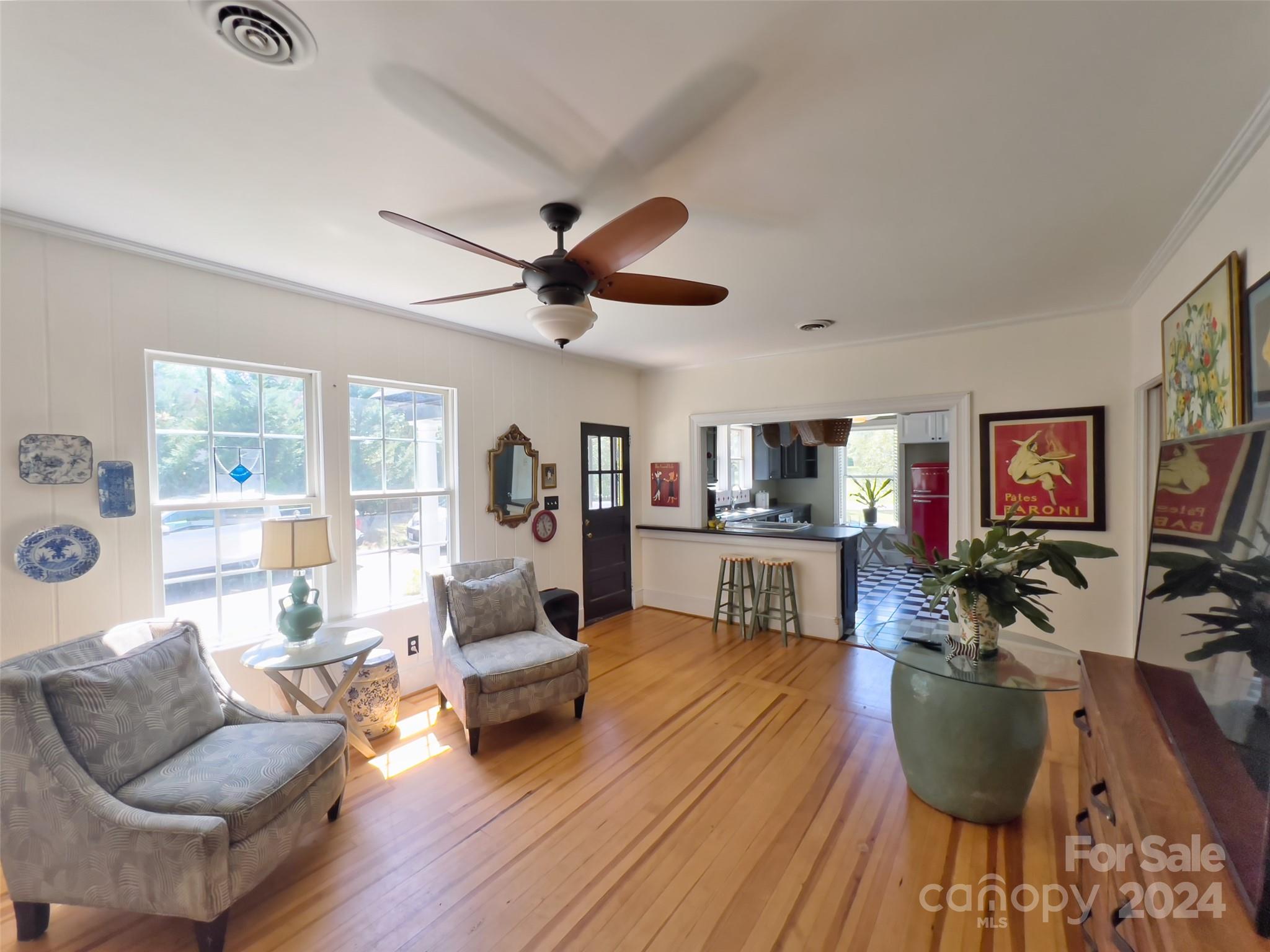 496 Chimney Rock Road Rutherfordton, NC 28139 - Photo 13 of 37 a living room with furniture and a wooden floor