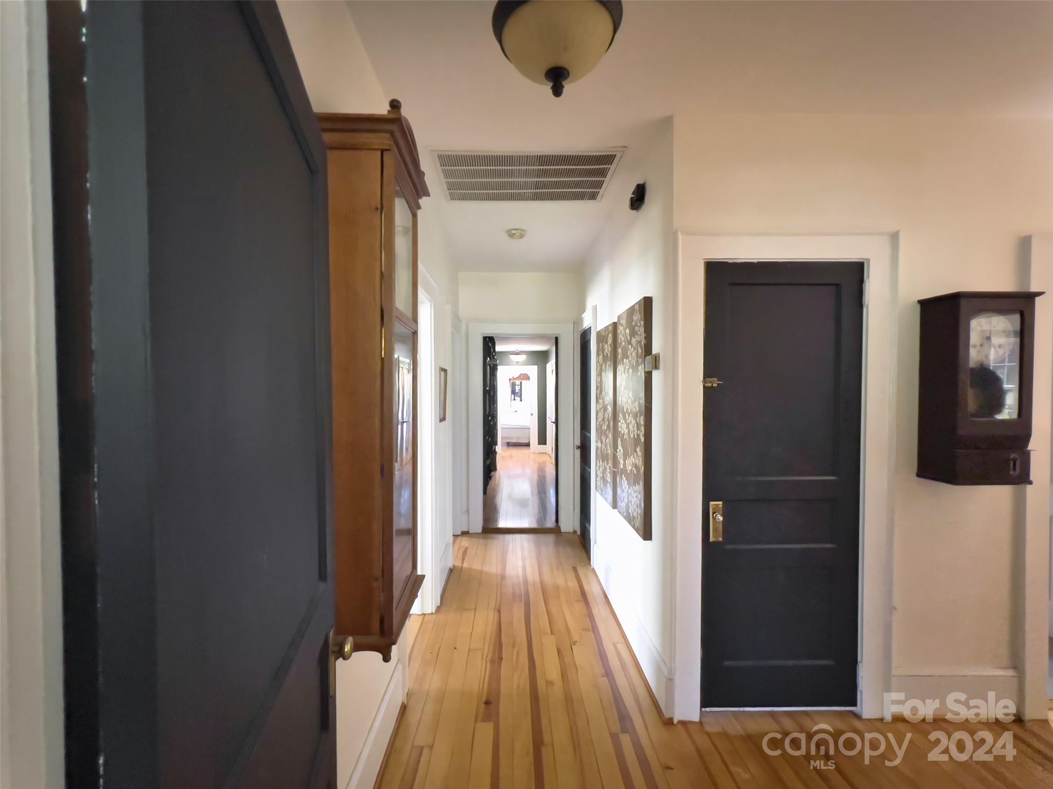 496 Chimney Rock Road Rutherfordton, NC 28139 - Photo 16 of 37 a view of hallway with wooden floor