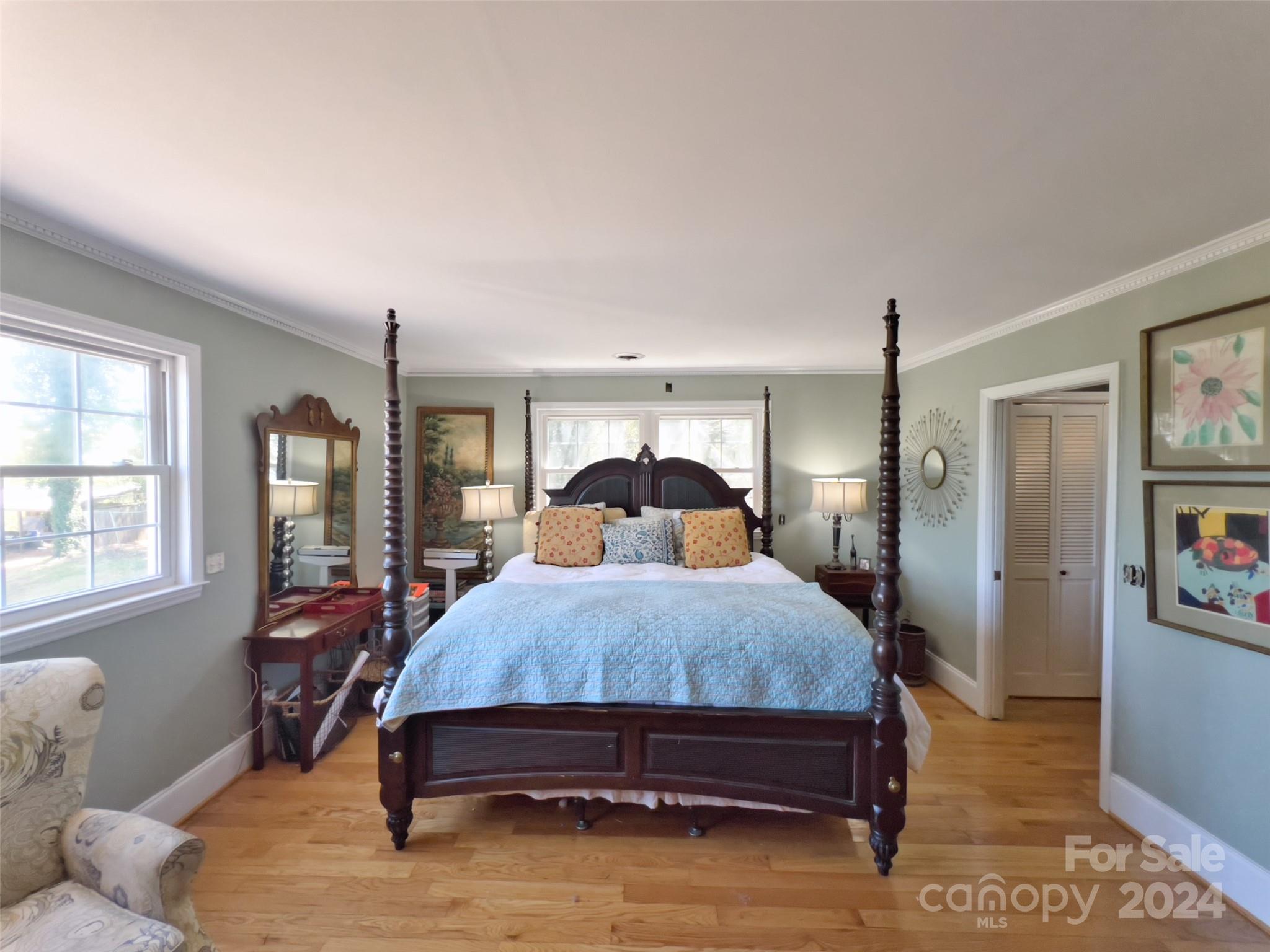 496 Chimney Rock Road Rutherfordton, NC 28139 - Photo 23 of 37 a bedroom with a bed window and dresser