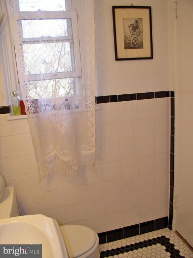 9 Ridge Road, Unit A Greenbelt, MD 20770 - Photo 27 of 30 Bath with classic ceramic tile surround