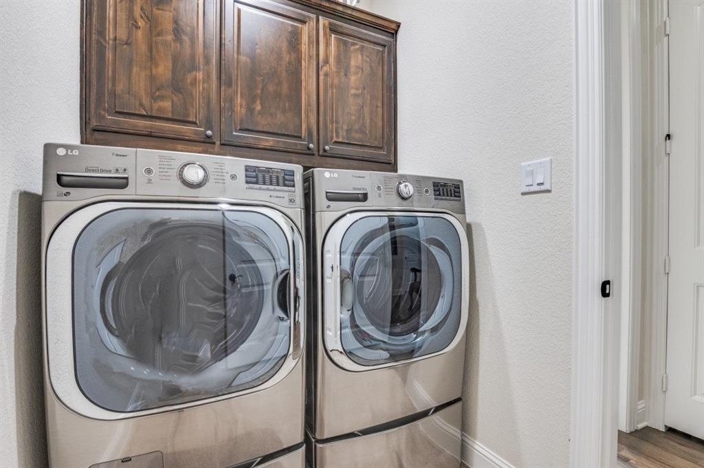 8210 Palmer Road Waxahachie, TX 75167 - Photo 17 of 39 a utility room with dryer and washer