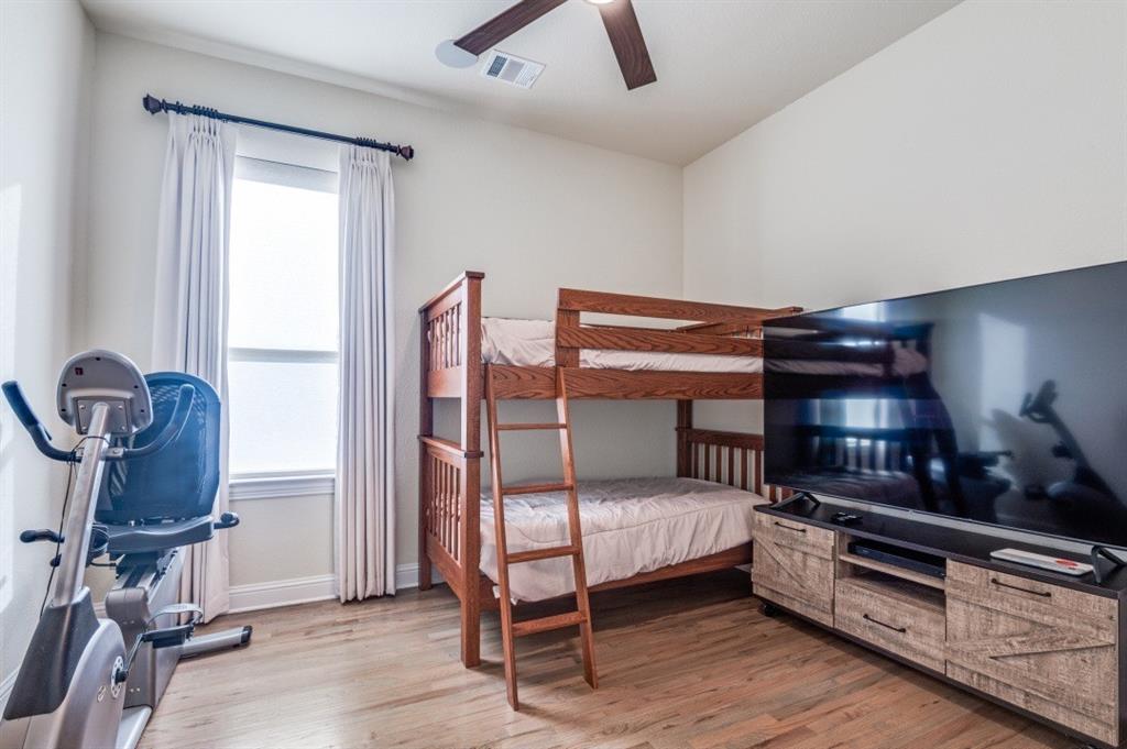 8210 Palmer Road Waxahachie, TX 75167 - Photo 21 of 39 a bedroom with furniture and window
