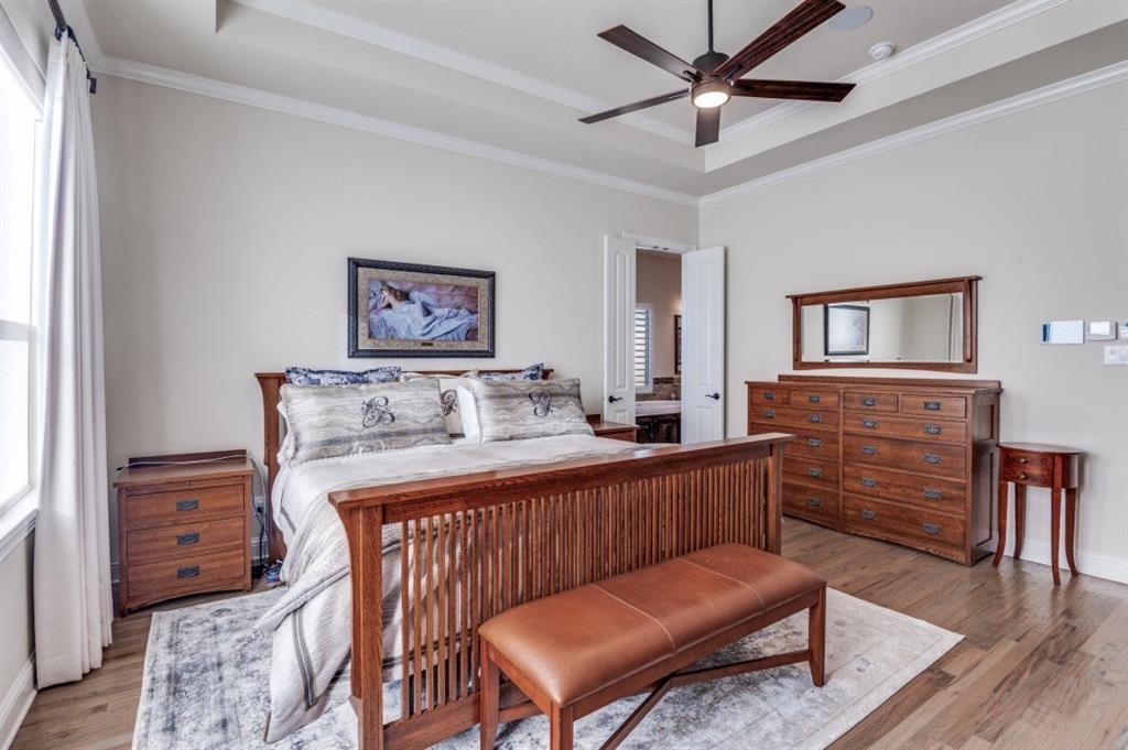 8210 Palmer Road Waxahachie, TX 75167 - Photo 23 of 39 a dining room with furniture and wooden floor