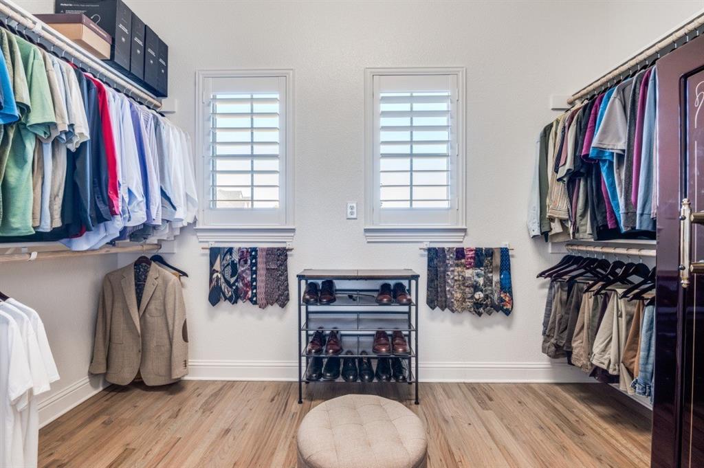 8210 Palmer Road Waxahachie, TX 75167 - Photo 27 of 39 a view of walk in closet with clothes and shoes