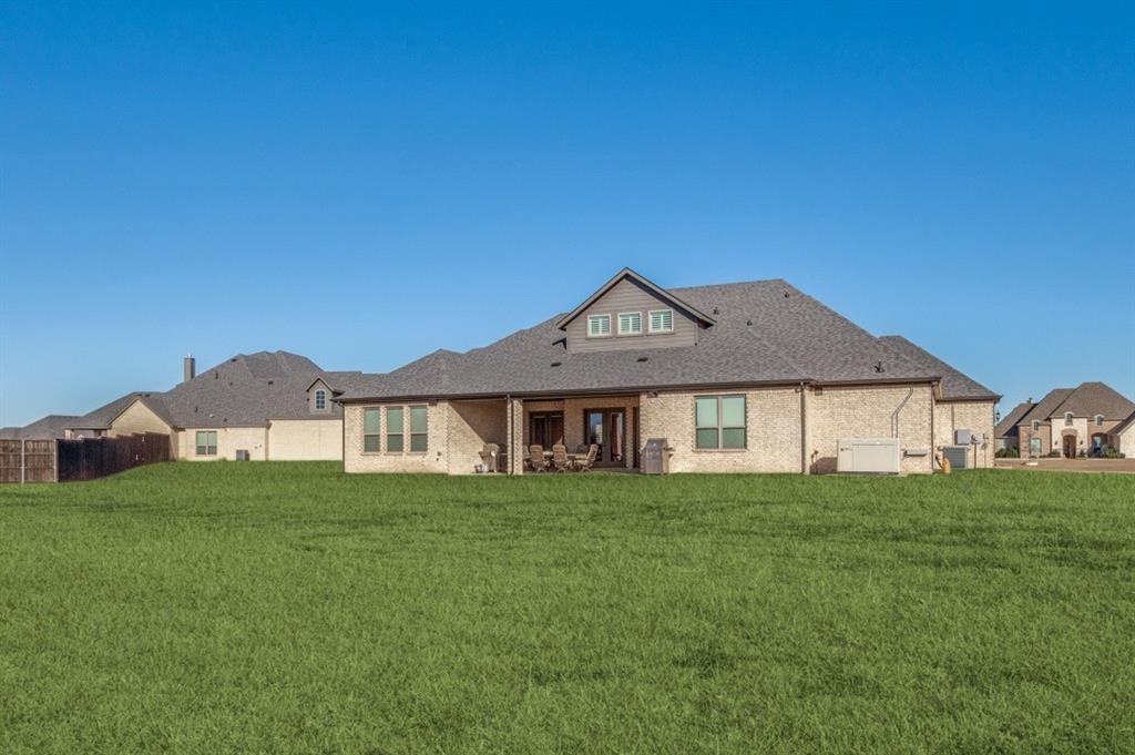 8210 Palmer Road Waxahachie, TX 75167 - Photo 30 of 39 a view of a house with a big yard