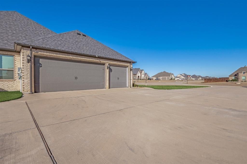 8210 Palmer Road Waxahachie, TX 75167 - Photo 3 of 39 a view of a house with a yard and balcony