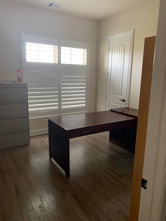 8210 Palmer Road Waxahachie, TX 75167 - Photo 31 of 39 a view of an empty room with wooden floor and a window