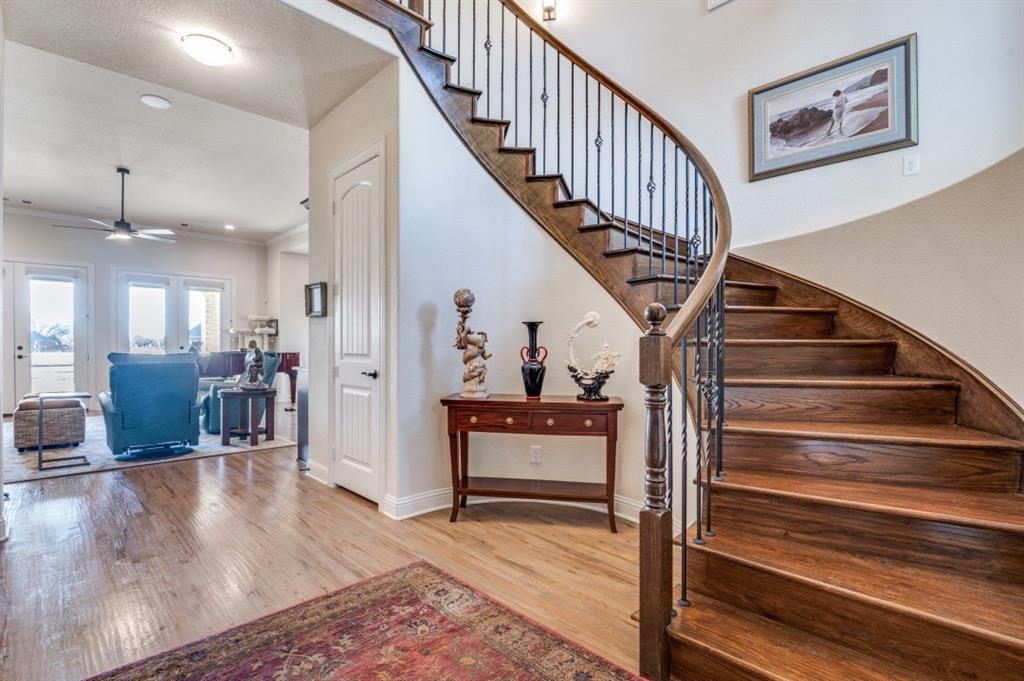 8210 Palmer Road Waxahachie, TX 75167 - Photo 4 of 39 a view of entryway and hall with wooden floor