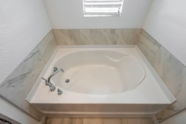 a room with storage and utility racks