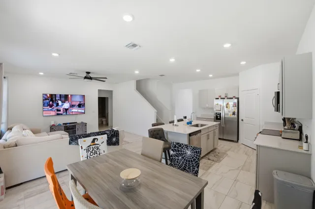 a living room with furniture and window