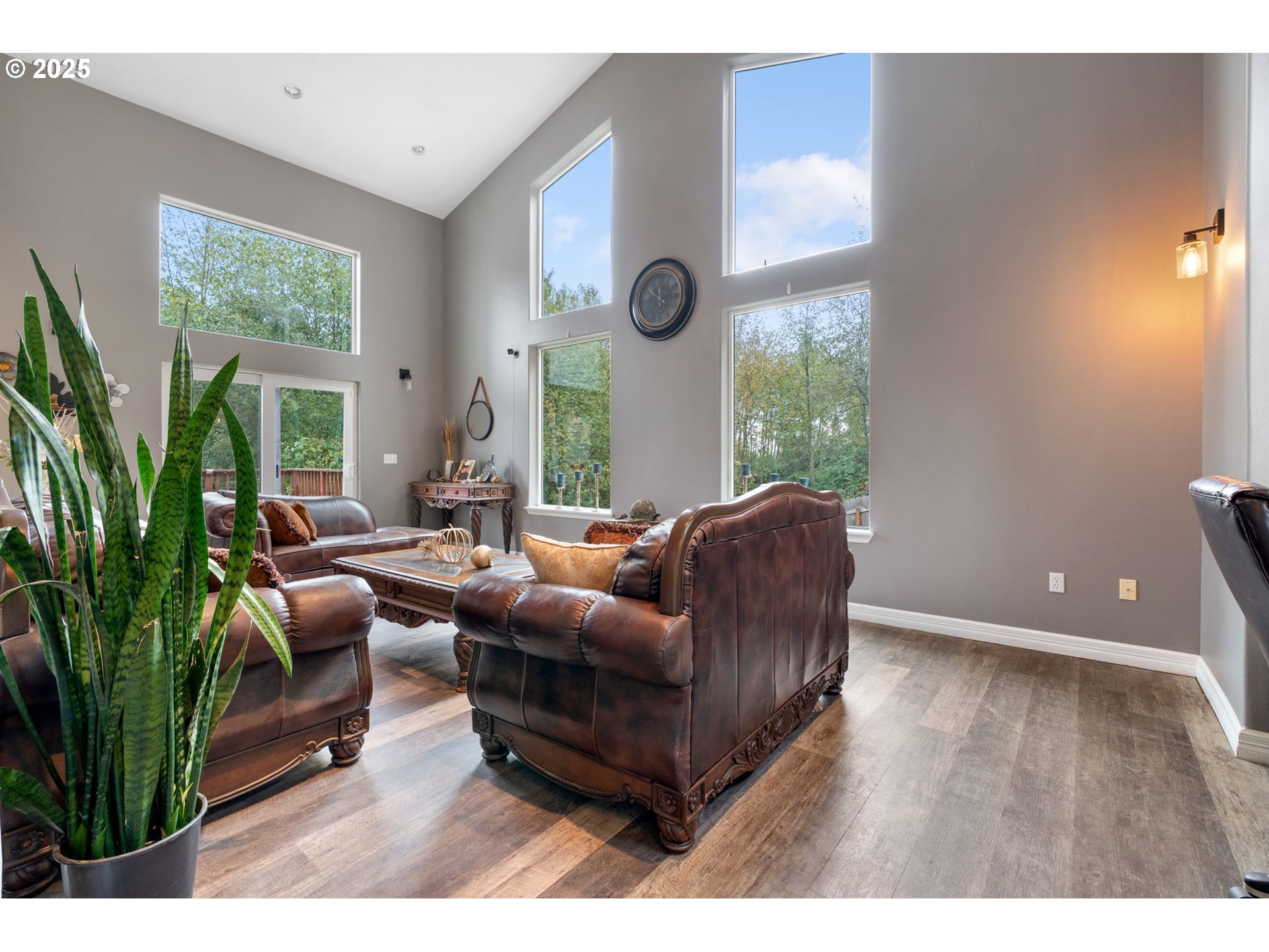 117 Altavista Road Longview, WA 98632 - Photo 6 of 40 a living room with furniture a large window and a potted plant
